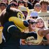 Buff fans take a selfie with Chip the buffalo mascot