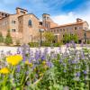 flowers in front of a campus building