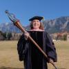 Leigh Holman in commencement regalia