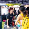 employee tabling at the Be Involved Fair