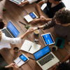 people shaking hands during a business meeting