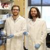 Anthony Straub with PhD student Kian Lopez in a lab