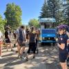 Families gathered at a station along the Buffalo Bicycle Classic's Little Buff ride