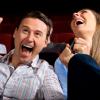 people laughing in a movie theater