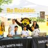 Student leaders tabling an event with Chip the buffalo mascot