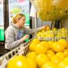 student working in a market on campus