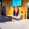 student employee working at The Connection front desk