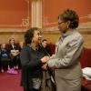 Professor Polly McClean, left, speaks with State Senator Rhonda Fields.