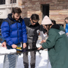 Engineering students working with snow