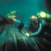 researchers scuba diving in the Mediterranean