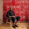 Rashid Johnson in front of a large painting