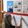 Students installing a Shakespearean science exhibit in Norlin Library