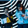 Members of the Game Changers take to the mic at a poetry slam