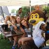 Student volunteers pose for a photo with Chip during move-in 2016