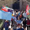 Conference on World Affairs flags fly in the quad. (Photo by Glenn Asakawa/University of Colorado)