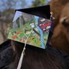 painted graduation cap with giant stuffed Buffalo in the background