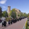Commencement procession in front of the Eaton Humanities building