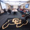 CU Buff rug in focus during a Diversity and Inclusion Summit session