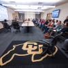 CU Buff rug in focus during a Diversity and Inclusion Summit session
