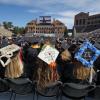 Decorated graduation caps during ceremony