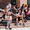 People reading on the steps of Norlin Library