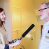 A person recording a podcast