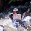 Man participates in Tube to Work Day in Boulder.