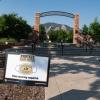 A Protect Our Herd–face covering required sign at the entrance of Farrand Field
