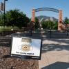 A Protect Our Herd–face covering required sign at the entrance of Farrand Field