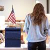 Campus community member voting in the UMC