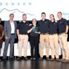 The team on stage at the competition receiving the award.