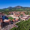 CU Boulder aerial campus view with foothills and mountains in the background.
