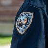 A CU Boulder police department emblem on a shirt sleeve.