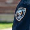 Police patch on a uniform sleeve