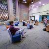 Students wear masks and stay socially distanced during a class at the Norlin Library 