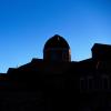 Silhouette of the Leeds School of Business building