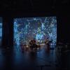 Musician plays in the ATLAS Black Box theater during the 2022 Culture Crawl