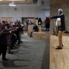 Nii Arma Sowah leads an audience in dance.