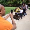 A family, minus their CU student, poses with Chip during move-in week at the University of Colorado Boulder. (Photo by Casey A. Cass/University of Colorado)