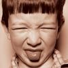 A child with a disgusted face