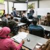 Students learning in a classroom