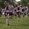 Hispanic people dancing in traditional clothes 