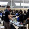 middle schoolers at an outreach fair