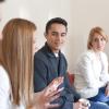 people sitting in a circle during a workshop