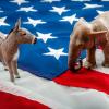 Photo of a donkey and elephant figurine on top of an American flag