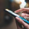 person reading text message