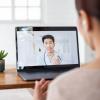 Person speaking to a doctor during a telehealth appointment