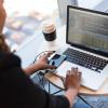 Person coding on laptop computer