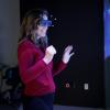 Scripps fellow wearing augmented reality goggles 