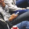 Person checks smartphone